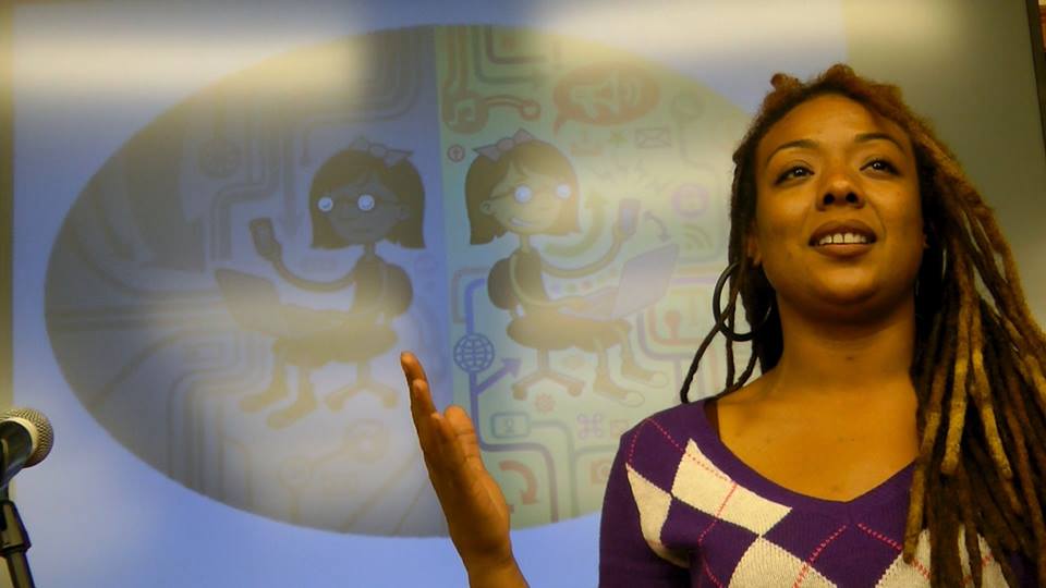 Jenniffer Johns sings to a packed room.